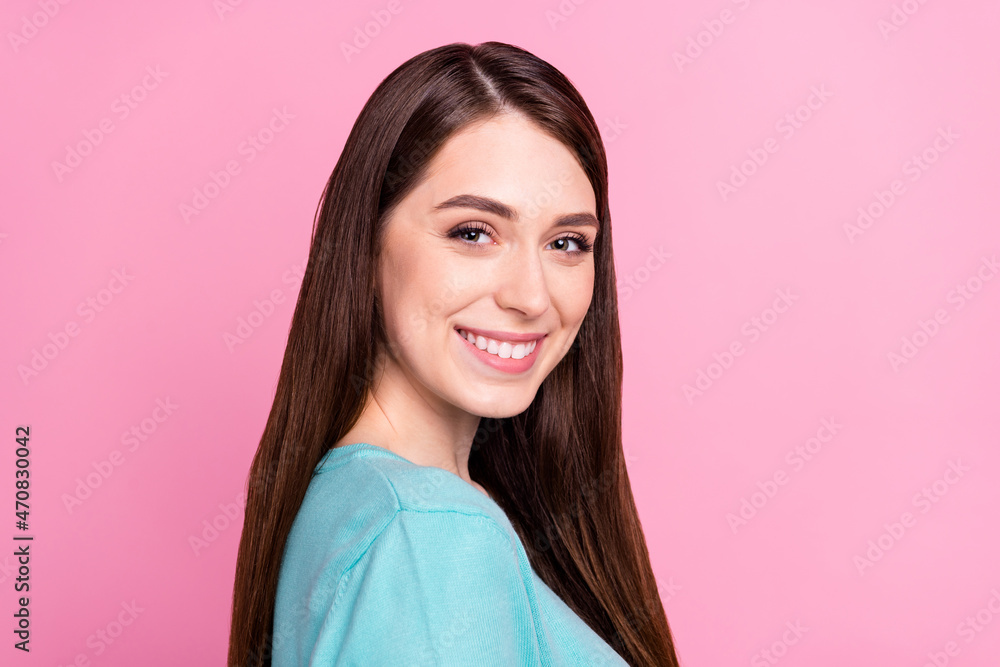 Profile side photo of charming pretty lovely young woman good mood smile isolated on pink color background Profile side photo of charming pretty lovely young woman good mood smile isolated on pink color background