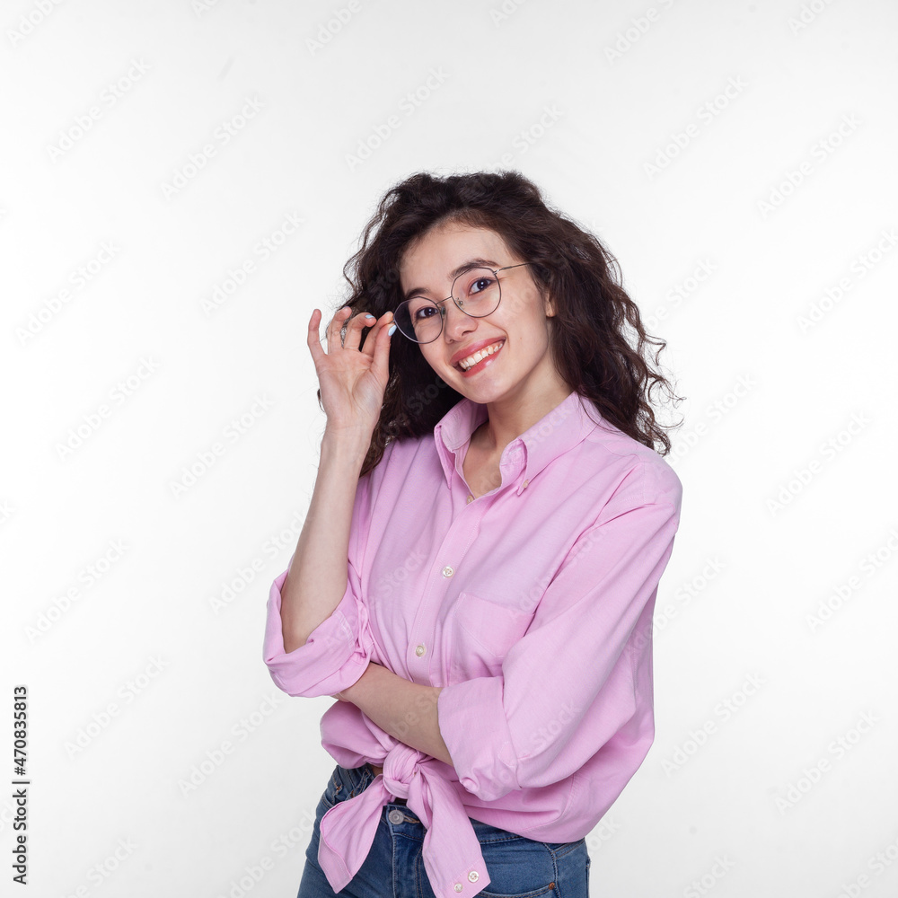 Portrait of a pretty smiling asian woman posing isolated on a white background Portrait of a pretty smiling asian woman posing isolated on a white background