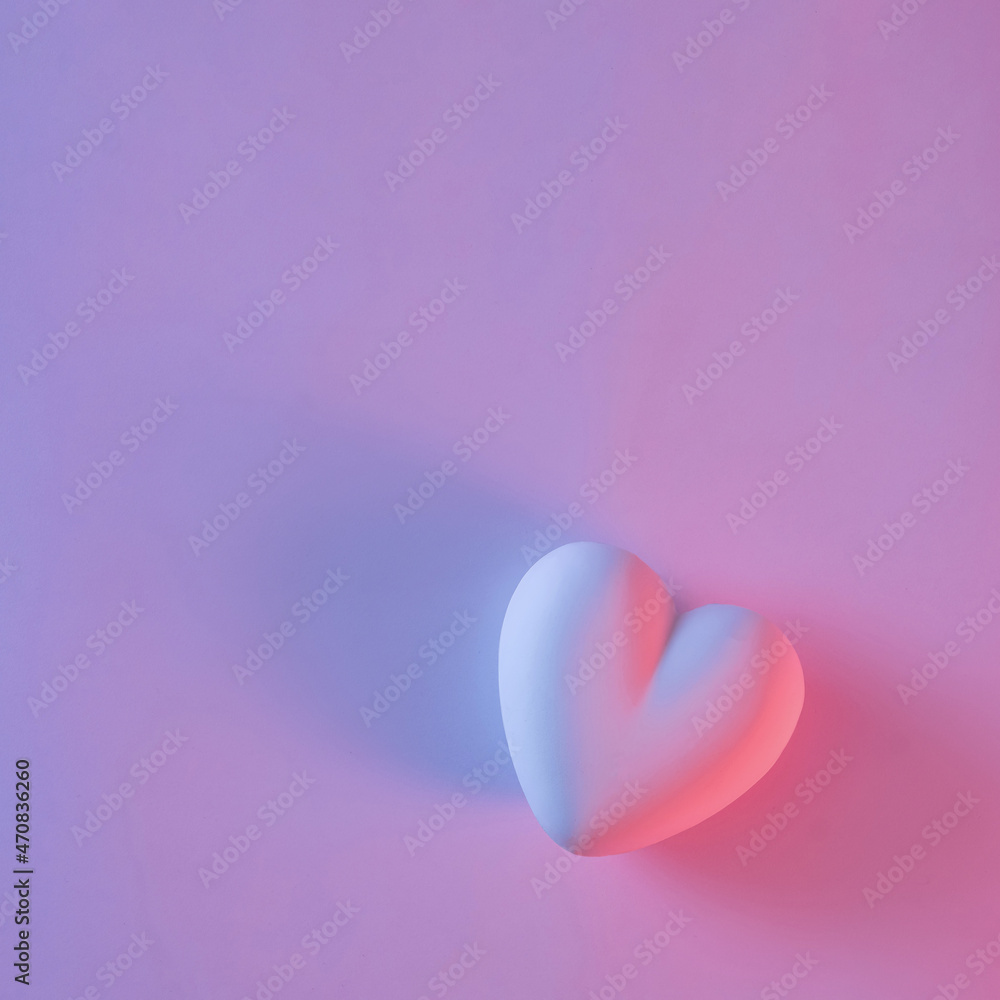 3d pink heart shape with shadow on pastel purple background 3d pink heart shape with shadow on pastel purple background