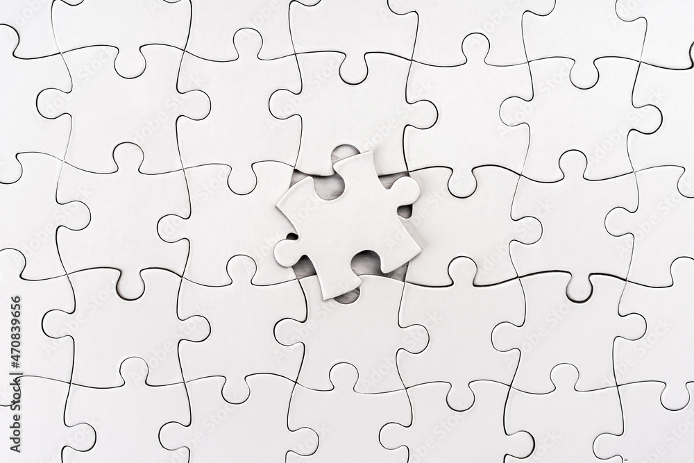 Close up view of empty jigsaw puzzle Close up view of empty jigsaw puzzle