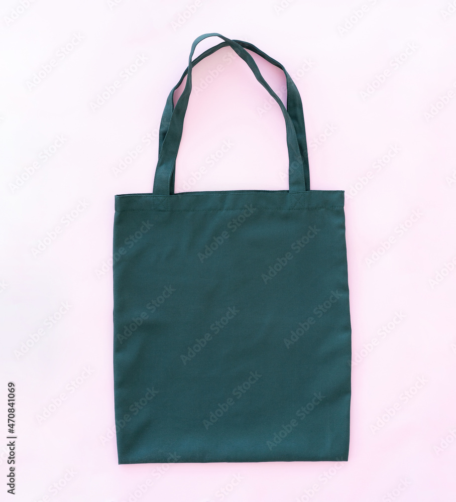 Comfy textile shopper bag on pink background Comfy textile shopper bag on pink background