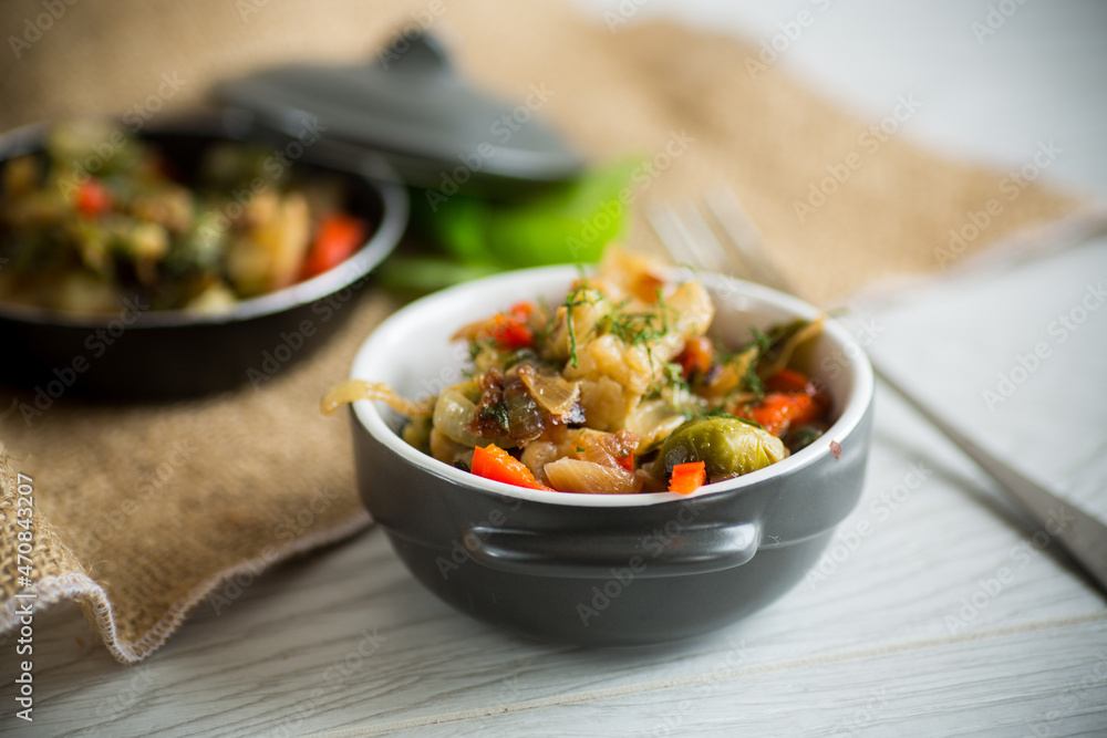 fried brussels sprouts with cauliflower and other vegetables in a bowl fried brussels sprouts with cauliflower and other vegetables in a bowl