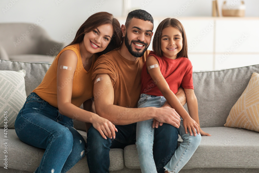 Happy Vaccinated Family Showing Adhesive Bandage After Vaccine - obrazy, fototapety, plakaty 