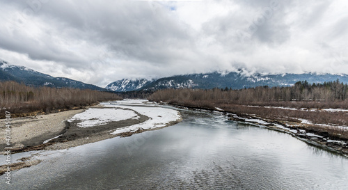 Snow covered Columbia River Valley near Rivelstock Canada overcast day