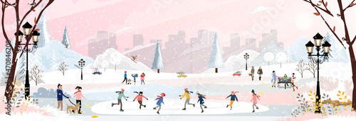 Winter landscape at night with people having fun doing outdoor activities on new year,Christmas day in village with people celebration, kid playing ice skates, teenagers skiing with snow falling