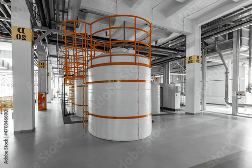 Photo of pipes and tanks. Chemistry and medicine production. Pharmaceutical factory