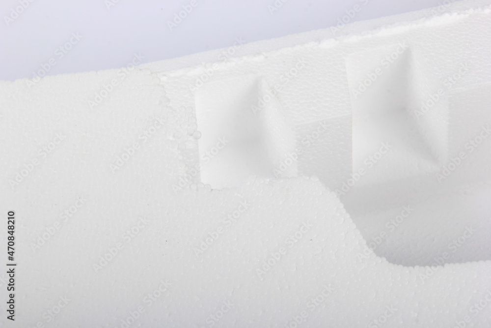 Styrofoam Sheets of different shapes on white background. Pieces of white styrofoam close up. Crumbled styrofoam pieces isolated on white background Styrofoam Sheets of different shapes on white background. Pieces of white styrofoam close up. Crumbled styrofoam pieces isolated on white background