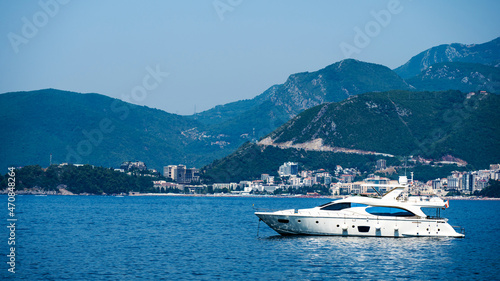 Boat in Adriatic sea with Budva view in Montenegro. Ancient city with mountains from yacht © Ievgen Skrypko