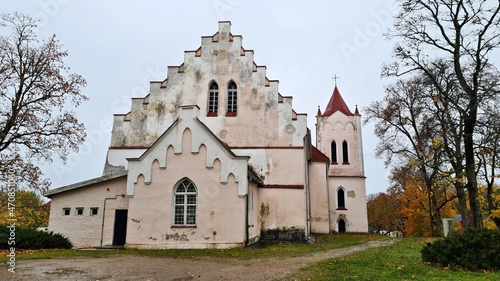 Very old Lutheran church in the Latvian village of Aizpute in late autumn 2021