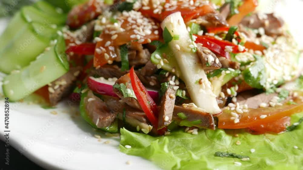 warm salad with meat, vegetables and sesame warm salad with meat, vegetables and sesame