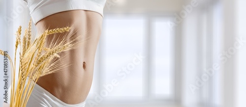 Celiac Disease And Gluten Intolerance. Women Holding Spikelet Of Wheat on a background photo