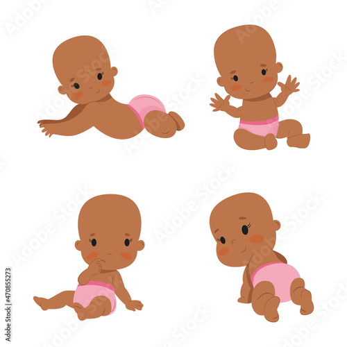 4 little girls in different poses a set of babies sitting a toddler raises his hands lies on his tummy thinks crawling, a girl in diapers © Business_Corn