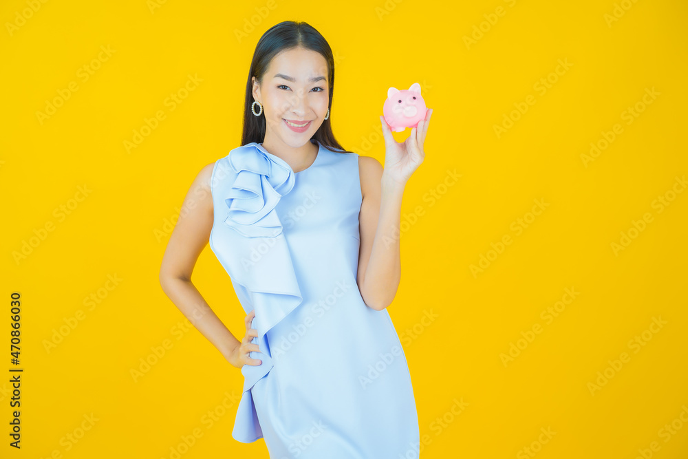 Portrait beautiful young asian woman with piggy bank Portrait beautiful young asian woman with piggy bank
