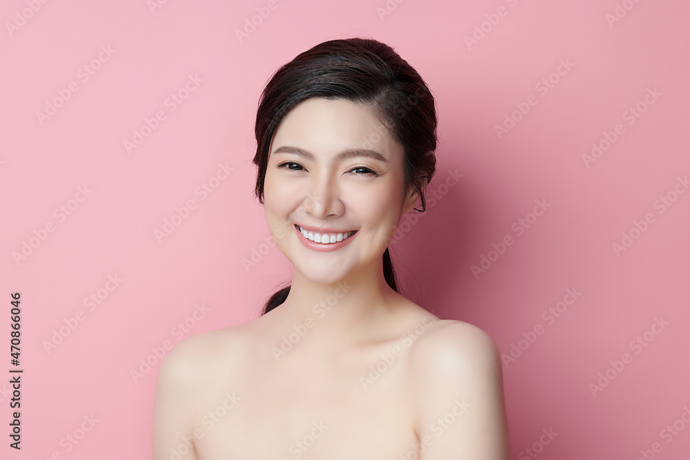 Beautiful young asian woman with clean fresh skin on pink background, Face care, Facial treatment, Cosmetology, beauty and spa, Asian women portrait. Beautiful young asian woman with clean fresh skin on pink background, Face care, Facial treatment, Cosmetology, beauty and spa, Asian women portrait.