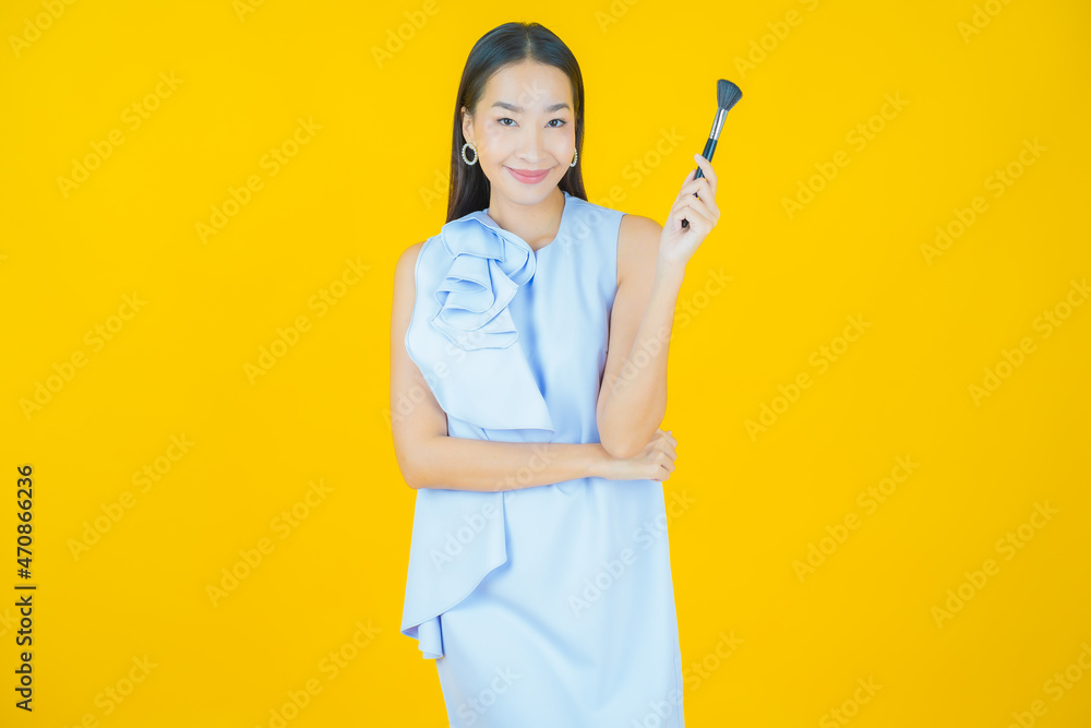 Portrait beautiful young asian woman with make up brush cosmetic Portrait beautiful young asian woman with make up brush cosmetic