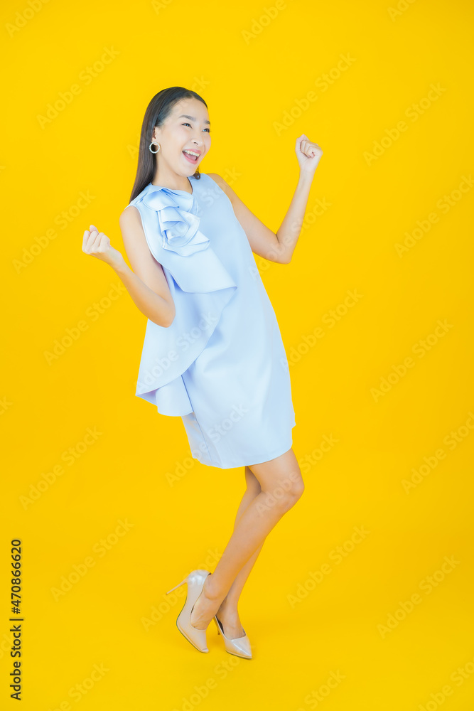 Portrait beautiful young asian woman smile with action Portrait beautiful young asian woman smile with action