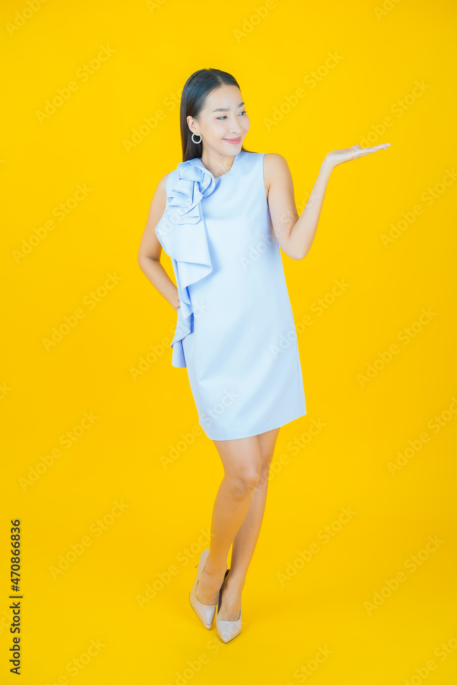 Portrait beautiful young asian woman smile with action Portrait beautiful young asian woman smile with action