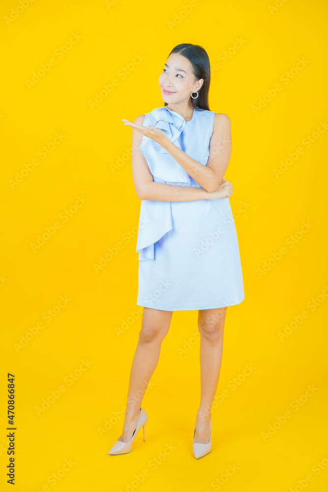 Portrait beautiful young asian woman smile with action Portrait beautiful young asian woman smile with action