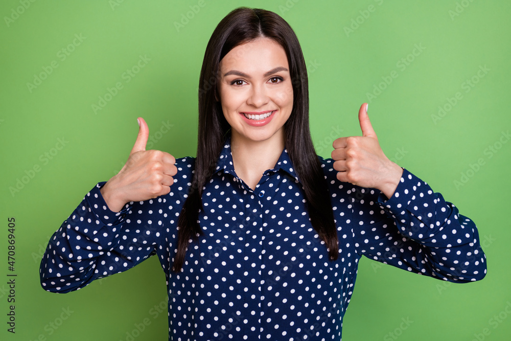 Photo of impressed brunette hairdo agent lady show thumb up wear blue shirt isolated on green color background Photo of impressed brunette hairdo agent lady show thumb up wear blue shirt isolated on green color background