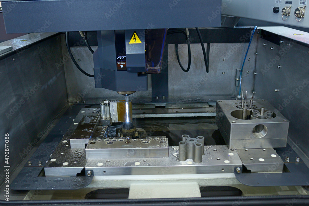 Electrical discharge machining. Electrical discharge machine EDM shapes ...
