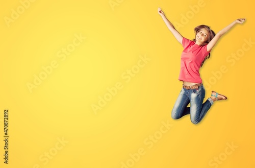 Full body of lady jump on colored background
