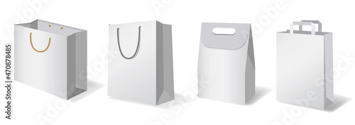 Realistic paper bag mockups of shopping. paper 
bag with handle isolated on white background. 
made of craft paper.