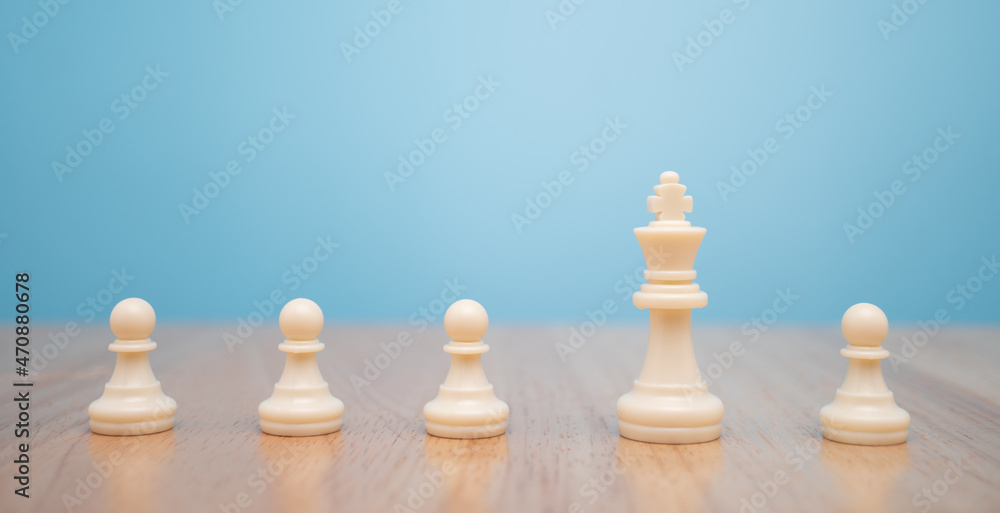 Chess King standing to Be around of other chess, Concept of a leader must have courage and challenge in the competition, leadership and business vision for a win in business games Chess King standing to Be around of other chess, Concept of a leader must have courage and challenge in the competition, leadership and business vision for a win in business games