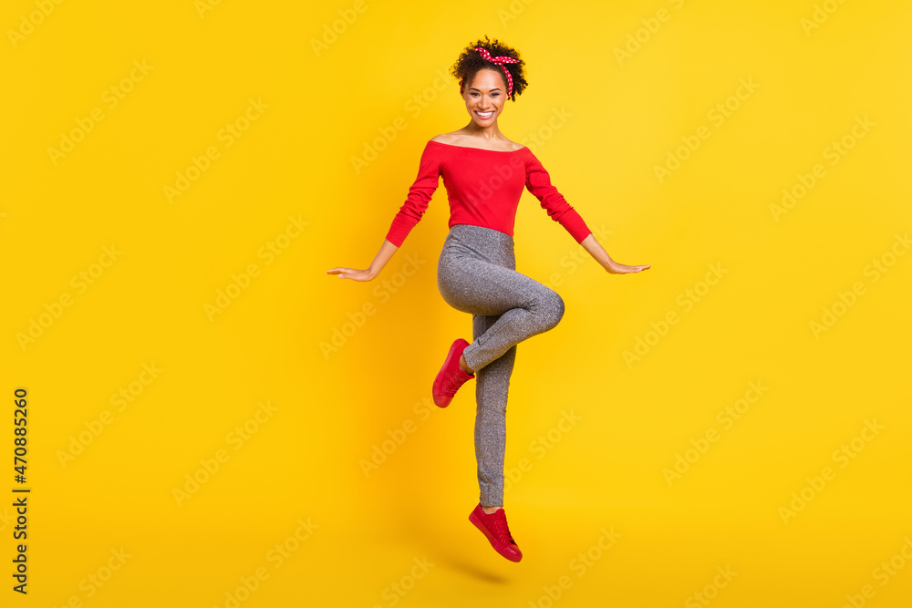 Photo of coquette positive nice lady jump enjoy flight wear pin-up outfit headband isolated yellow color background
