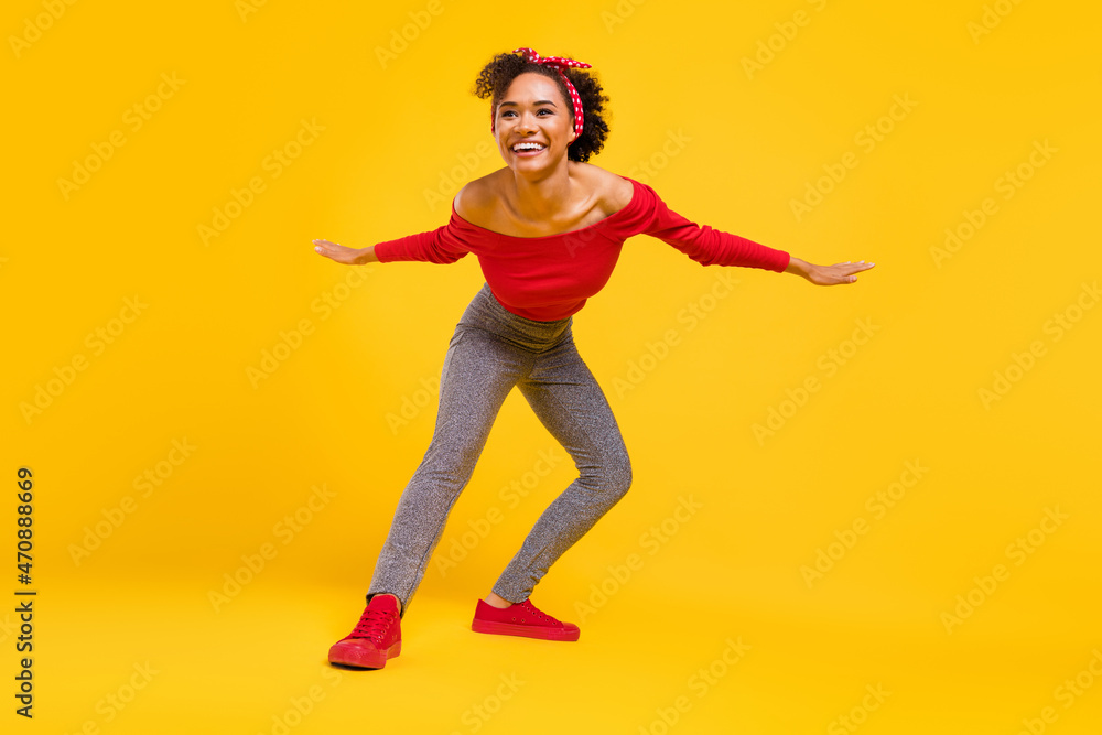 Photo of ready cute lovely lady dance prepare dance wear pin-up outfit shiny pants isolated yellow color background