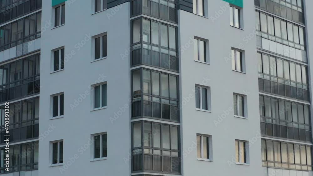 Aerial view of a residential building against the backdrop of an urban landscape Aerial view of a residential building against the backdrop of an urban landscape