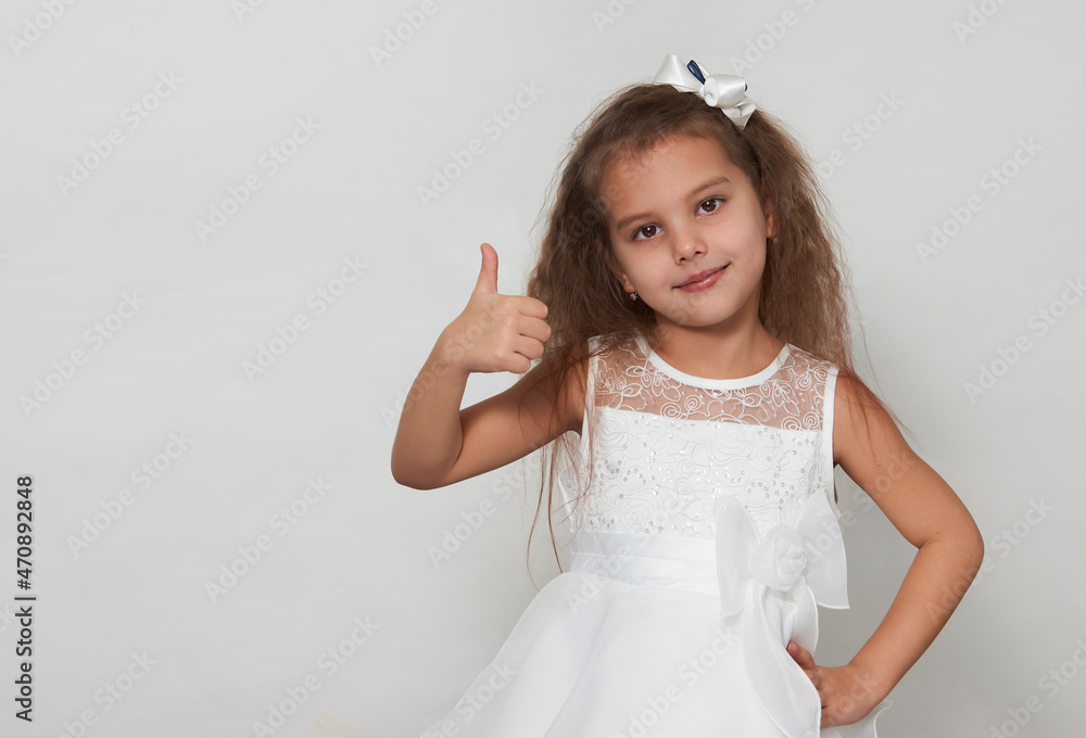 Cute girl portrait on a white background with copy space Cute girl portrait on a white background with copy space