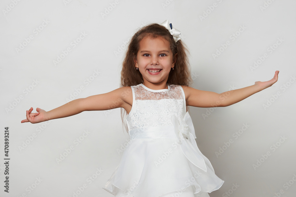 Cute girl portrait on a white background with copy space Cute girl portrait on a white background with copy space