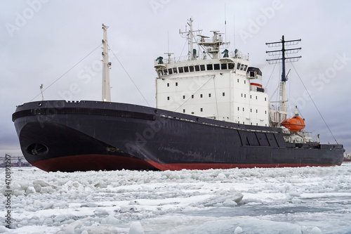 The icebreaker working in the fairway of the Gulf of Finland