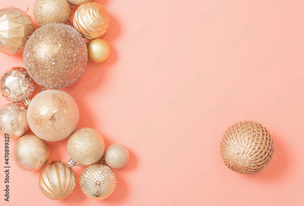 Fototapeta premium golden christmas balls on orange paper background