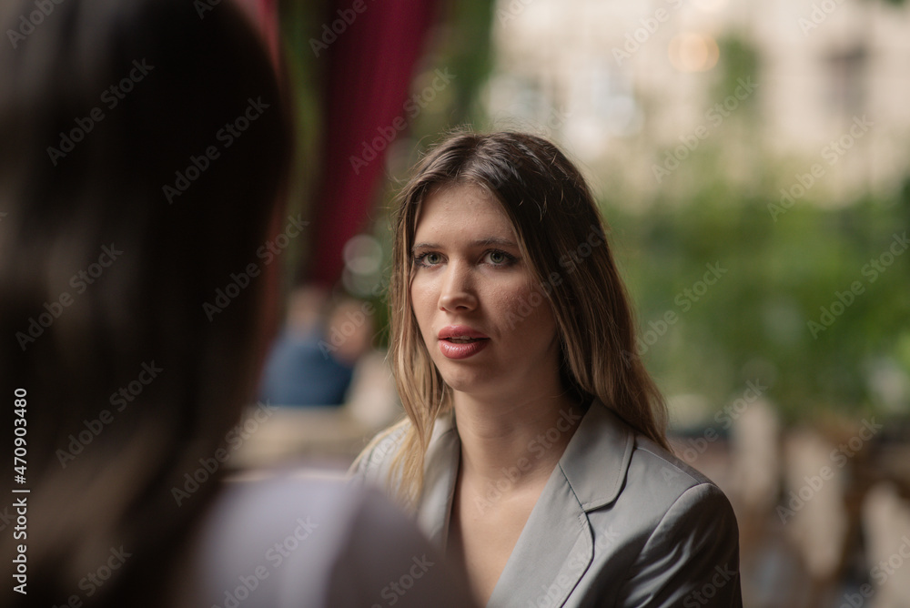 Looking and telling her something Looking and telling her something