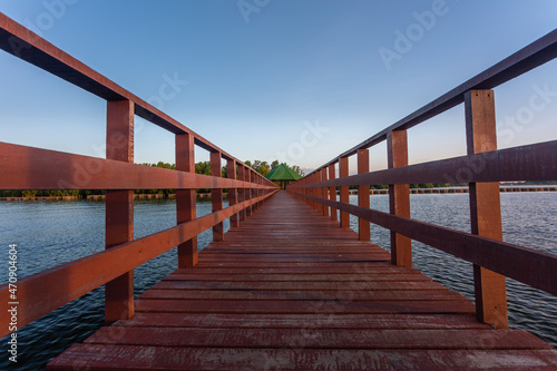 The forest mangrove with wooden walkway bridge Red bridge and bamboo line