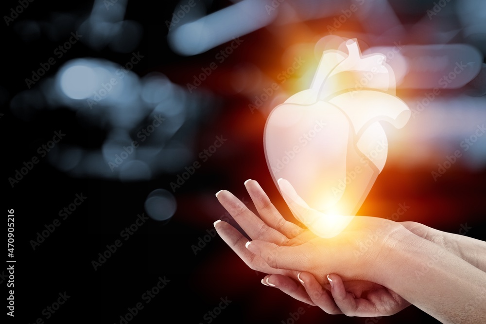 Innovative medicine concept. Heart symbol in hands Innovative medicine concept. Heart symbol in hands