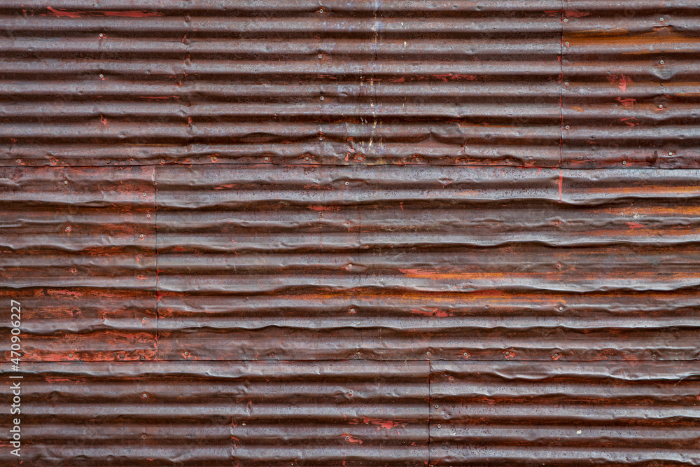 old, grunge, rusty, corrugated metal texture background - wall of weathered shack old, grunge, rusty, corrugated metal texture background - wall of weathered shack