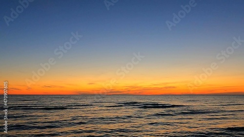 A background photo with the ocean and the sky