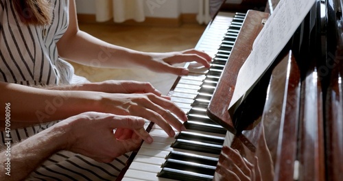 A photo of a piano lesson