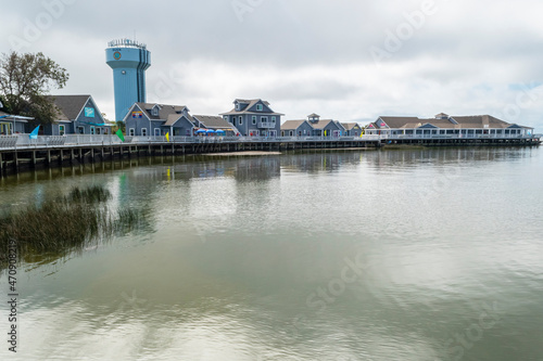 Fotografie Duck a town on N C outer banks Horizontal Photo, Photograph is the boardwalk starting point of a 1 mil