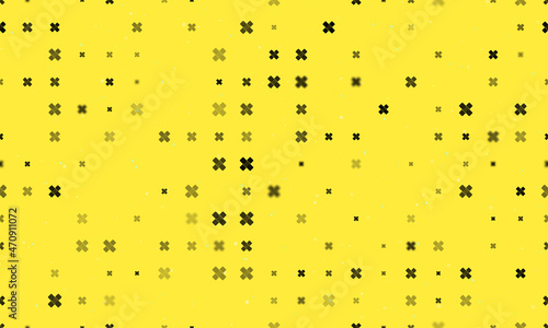 Seamless background pattern of evenly spaced black adhesive plaster symbols of different sizes and opacity. Vector illustration on yellow background with stars