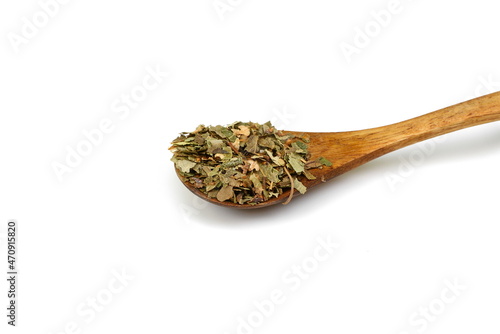 Herb - dry birch leaf (Betulae folium) isolated on the white background. Birch sap and birch leaves.