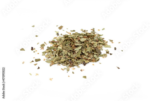 Herb - dry birch leaf (Betulae folium) isolated on the white background. Birch sap and birch leaves.