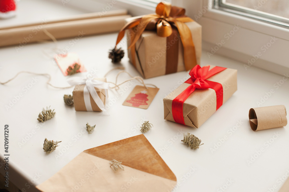 Wrapping christmas presents and gifts. Gift boxes for holiday season before gift giving. Wrapping christmas presents and gifts. Gift boxes for holiday season before gift giving.