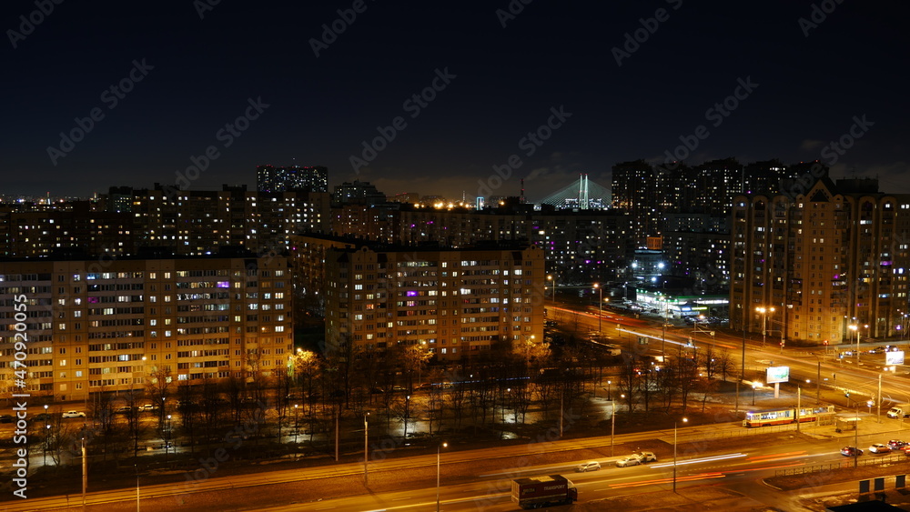 St. Petersburg at night from a bird's eye view, city lights, night traffic, lights in the windows of buildings