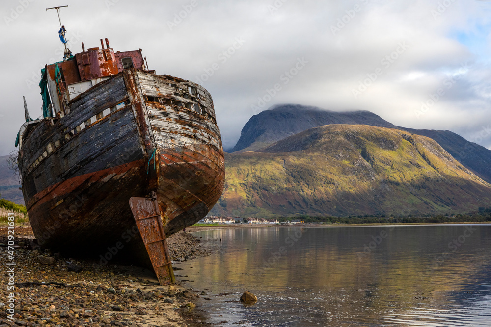 Old Boat of Caol and Ben Nevis in Scotland, UK. Stock-Foto | Adobe Stock