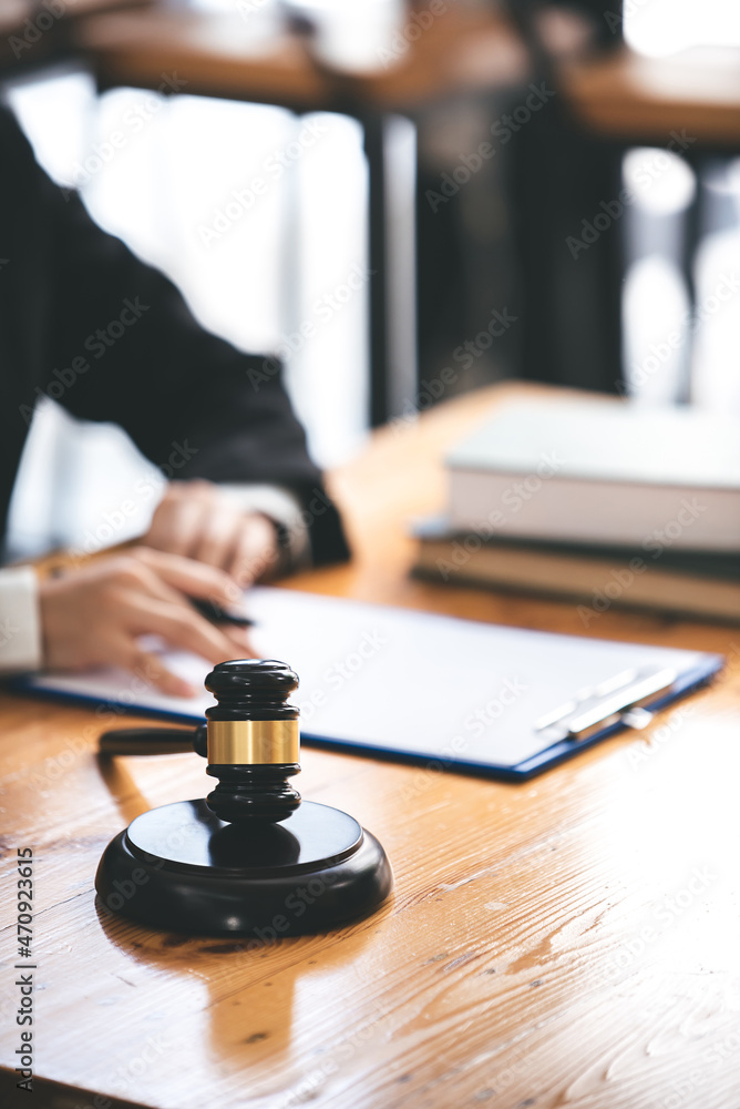judge with hammer lawyer justice a businessman in a suit or a lawyer working on paperwork Legal concepts, advice and justice