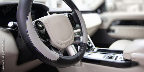 Modern car - interior, steering wheel and dashboard © Alena