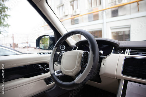 Modern car - interior, steering wheel and dashboard